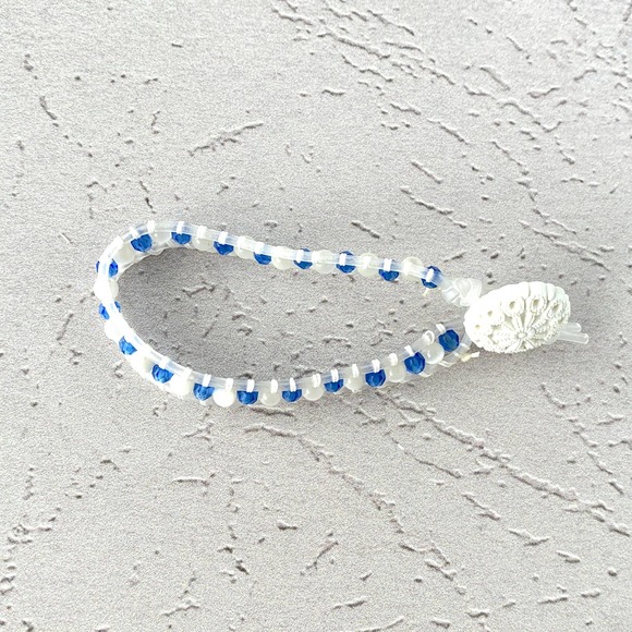 Sapphire Faceted Glass Single Wrap Clear Cord Bracelet - Picture 2 of 3